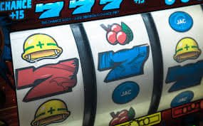 Smartphone displaying 77pub slot games interface optimised for Filipino mobile players